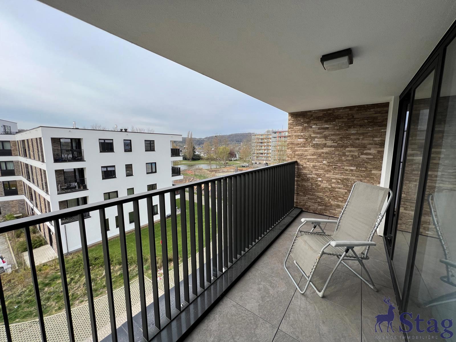 Appartement 2 chambres avec terrasse, parking et cave