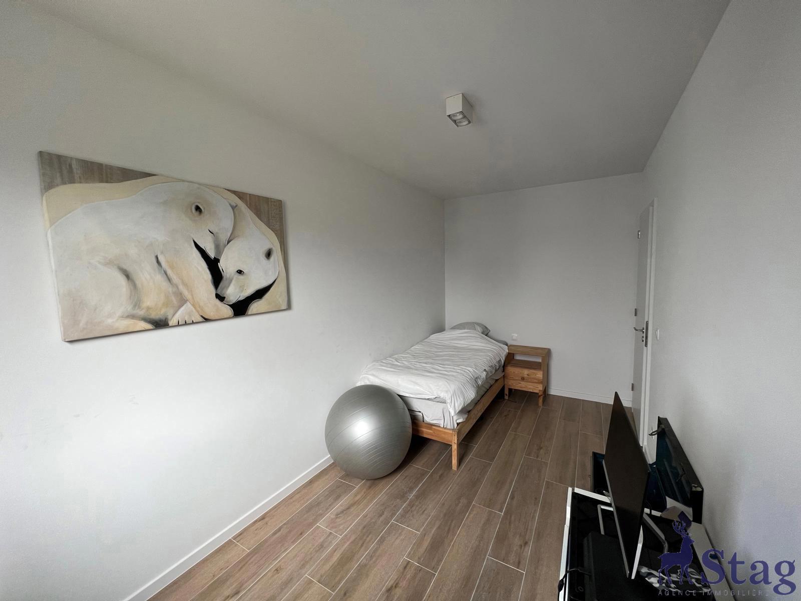 Appartement 2 chambres avec terrasse, parking et cave