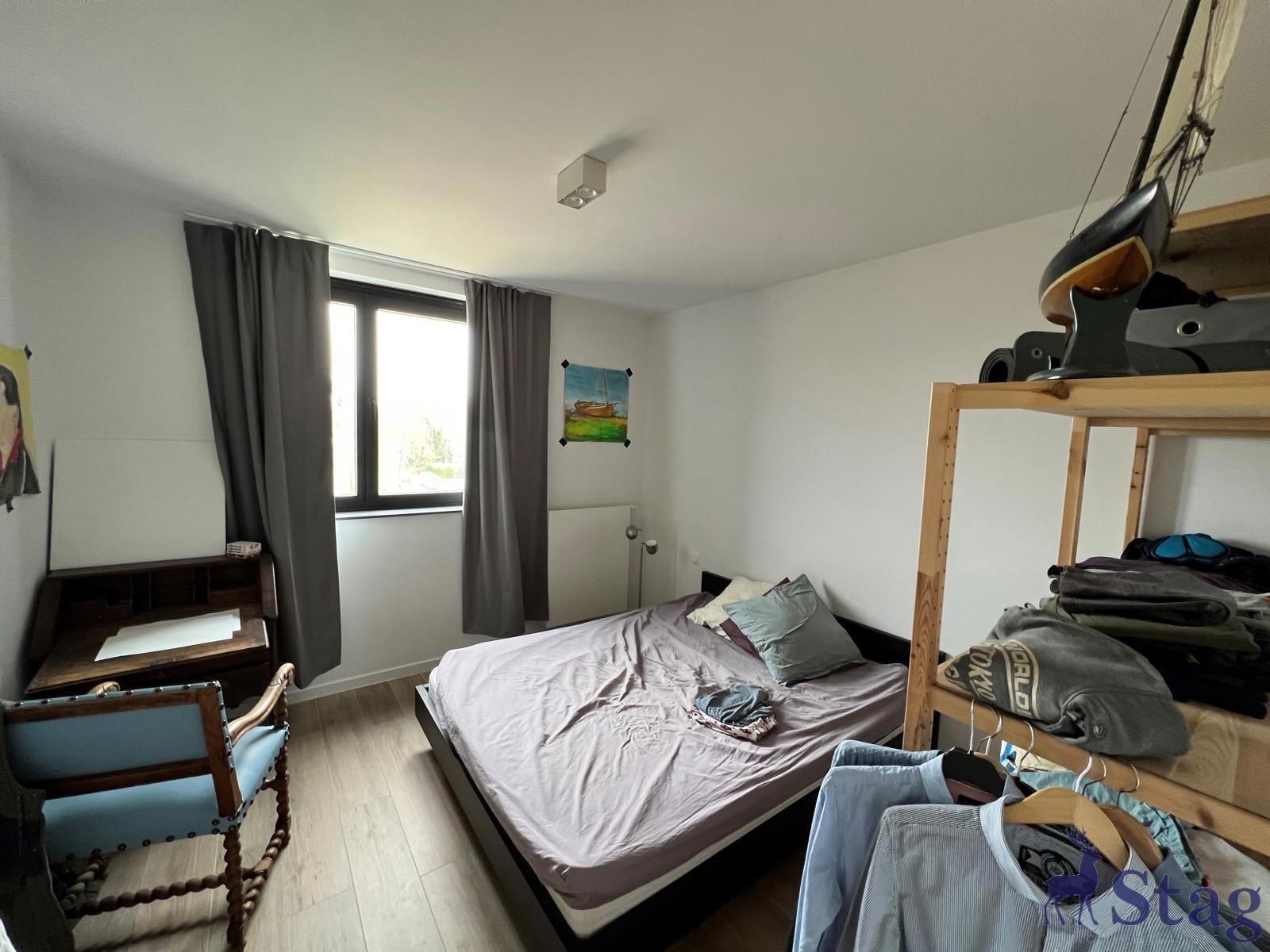 Appartement 2 chambres avec terrasse, parking et cave