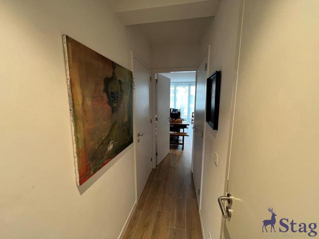 Appartement 2 chambres avec terrasse, parking et cave