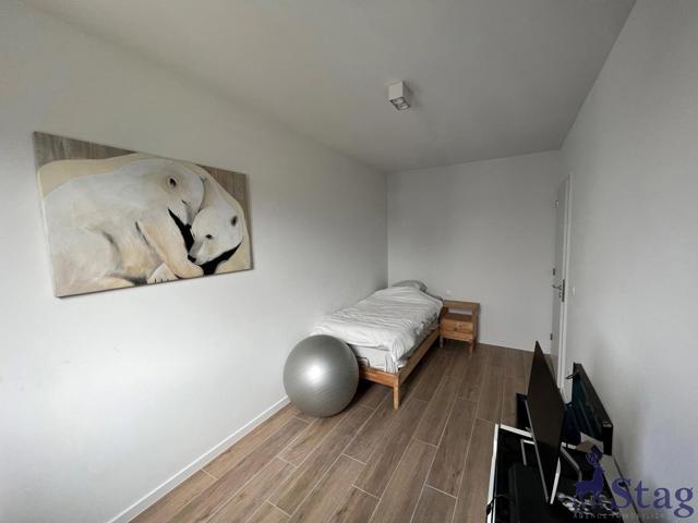 Appartement 2 chambres avec terrasse, parking et cave