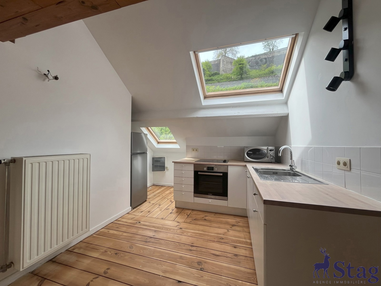 Studio avec mezzanine et vue imprenable sur la Meuse