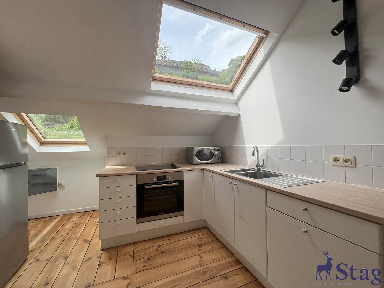 Studio avec mezzanine et vue imprenable sur la Meuse