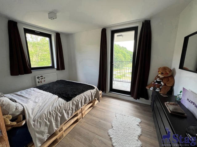 Spacieux appartement 2 chambres terrasse, parking et cave