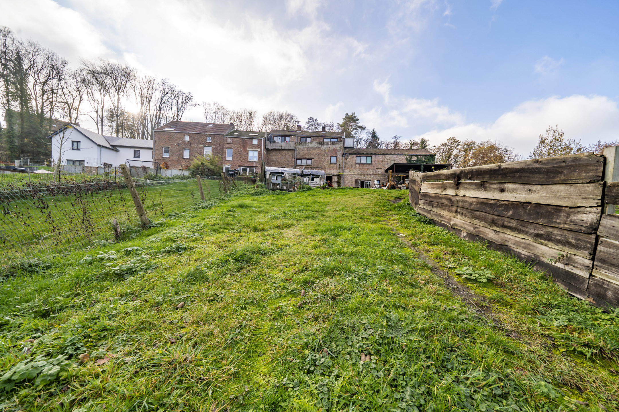 Photo maison Immeuble mixte avec un terrain constructible 