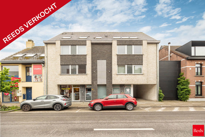 Appartement met terras en garagebox