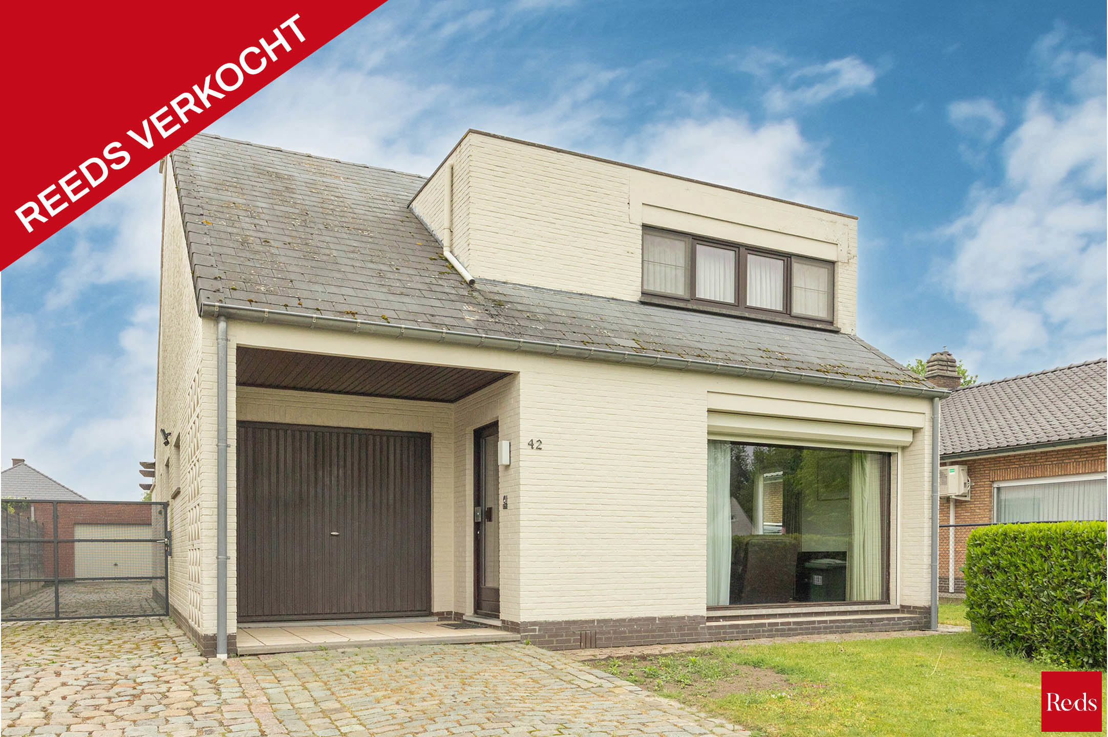 Open bebouwing met tuin en garage