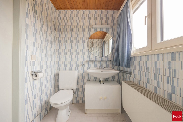 Open bebouwing met tuin en garage