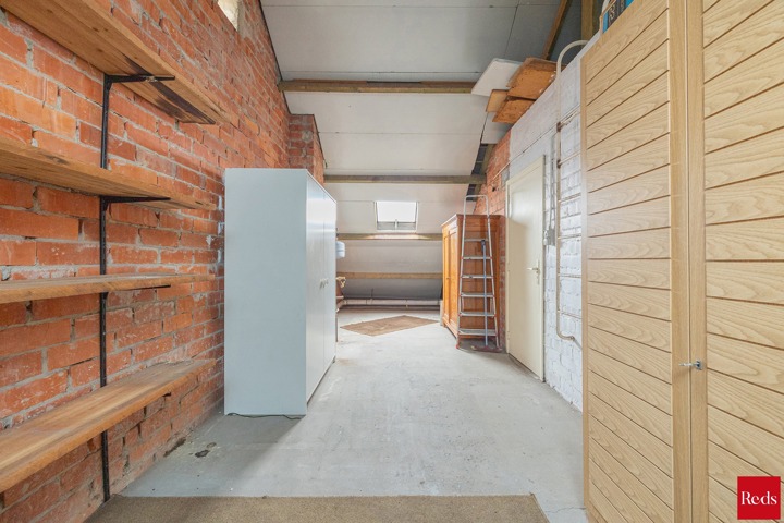 Open bebouwing met tuin en garage