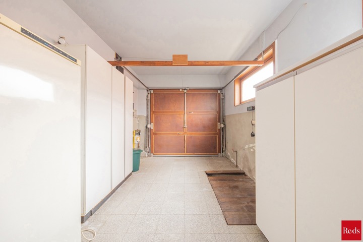 Open bebouwing met tuin en garage