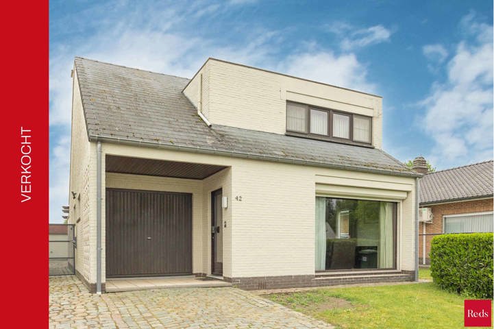 Open bebouwing met tuin en garage