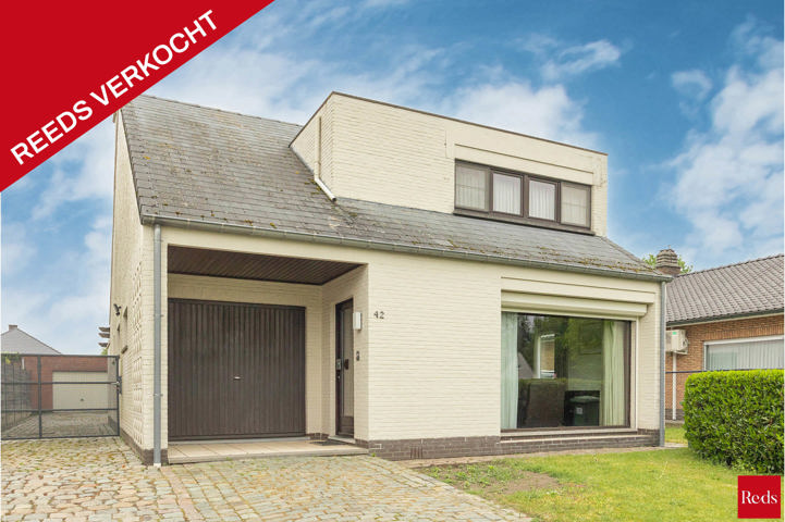 Open bebouwing met tuin en garage