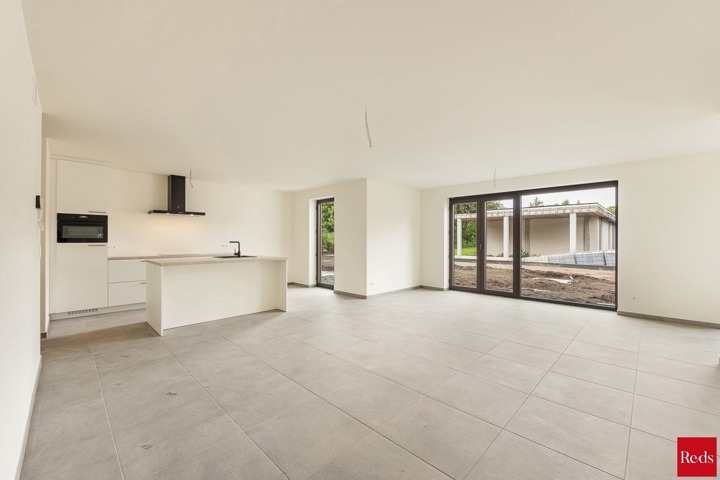 Nieuwbouw gelijkvloers appartement met tuin en terras