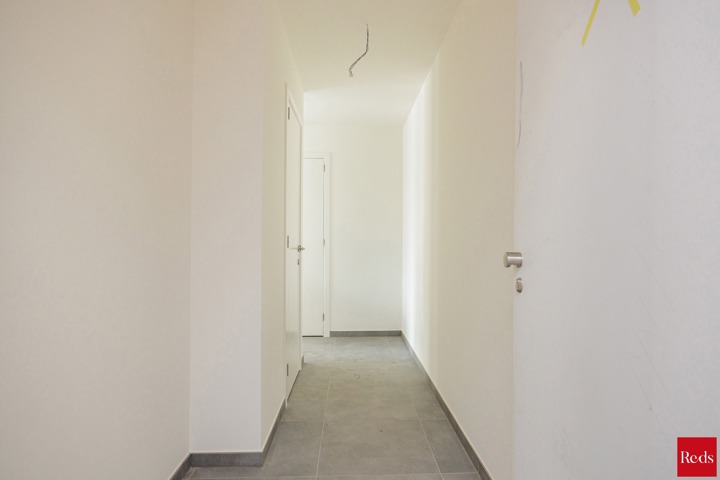 Nieuwbouw gelijkvloers appartement met tuin en terras