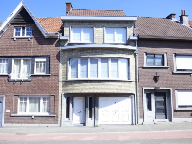 Centraal gelegen woning met grote tuin en garage te Aalst.