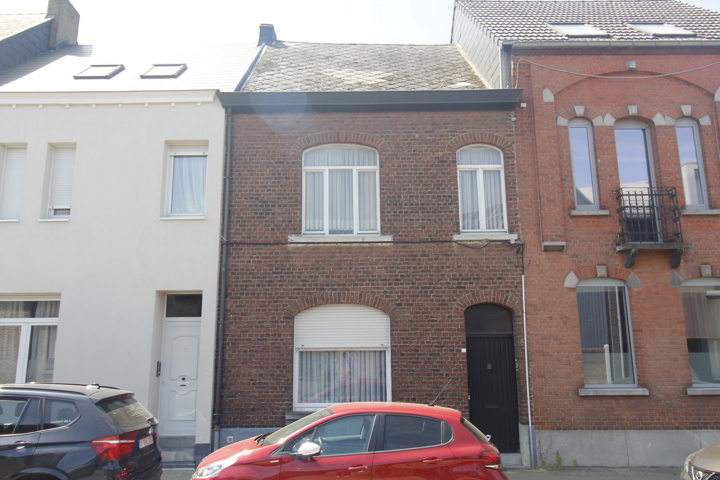 Woning met terras/tuin en garage te Erembodegem!