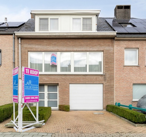 Rustig gelegen bel-etage met tuin en garage te Erembodegem !
